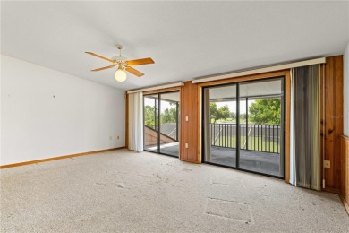 SPACIOUS POOL HOME OVERLOOKING GOLF COURSE IN LAKE SUZY on Kingsway Country Club in Florida - for sale on GolfHomes.com, golf home, golf lot