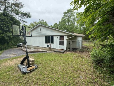 Country home, nice fenced back yard, with updates 1,452 Square on Cedar Glade Golf Course in Arkansas - for sale on GolfHomes.com, golf home, golf lot