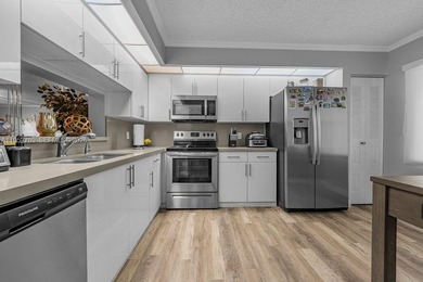 Beautifully renovated 2-bedroom, 2-bathroom apartment located in on Flamingo Lakes Country Club in Florida - for sale on GolfHomes.com, golf home, golf lot