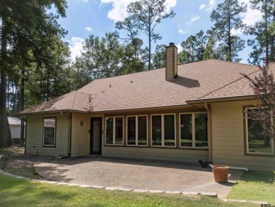 Located only a few minutes from the entrance of Holly Lake Ranch on Holly Lake Ranch Golf Club in Texas - for sale on GolfHomes.com, golf home, golf lot