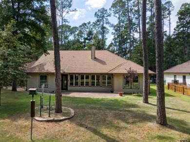 Located only a few minutes from the entrance of Holly Lake Ranch on Holly Lake Ranch Golf Club in Texas - for sale on GolfHomes.com, golf home, golf lot