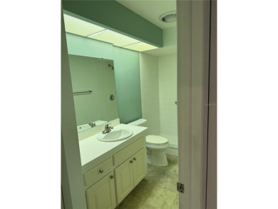 Carefree Florida living in Palm Harbor.  A small investment in on Highland Lakes Executive Golf Course in Florida - for sale on GolfHomes.com, golf home, golf lot