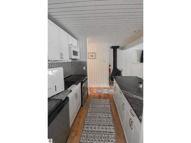 Beautifully updated 3BR/2BA condo sold fully furnished on  in Michigan - for sale on GolfHomes.com, golf home, golf lot