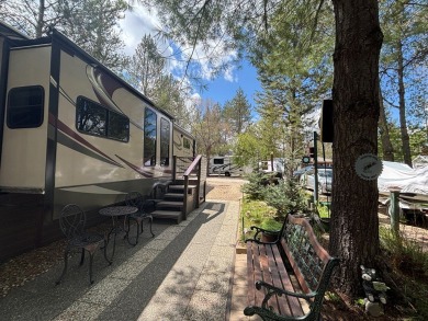 ENJOY AND RELAX!  Shade trees, pavers, flower garden, sprinkler on Cascade Golf Course in Idaho - for sale on GolfHomes.com, golf home, golf lot