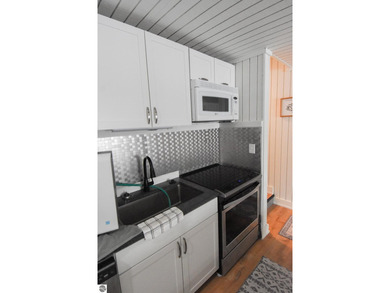 Beautifully updated 3BR/2BA condo sold fully furnished on  in Michigan - for sale on GolfHomes.com, golf home, golf lot