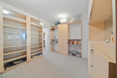 Beautiful corner condo with panoramic water views. Wood floors on Turnberry Isle Resort and Club in Florida - for sale on GolfHomes.com, golf home, golf lot