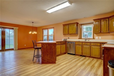 Welcome to this spacious and inviting colonial in the desirable on Grey Hawk Golf Club in Ohio - for sale on GolfHomes.com, golf home, golf lot