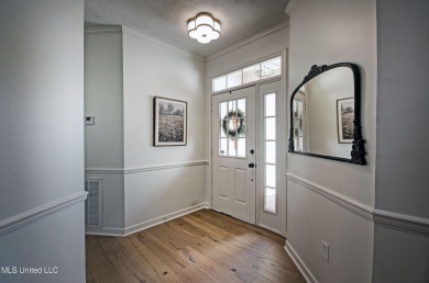 Discover modern comfort and golf course living in this on Bay Pointe Golf and Resort in Mississippi - for sale on GolfHomes.com, golf home, golf lot