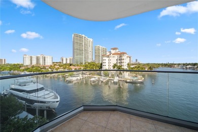 Beautiful corner condo with panoramic water views. Wood floors on Turnberry Isle Resort and Club in Florida - for sale on GolfHomes.com, golf home, golf lot