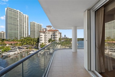 Beautiful corner condo with panoramic water views. Wood floors on Turnberry Isle Resort and Club in Florida - for sale on GolfHomes.com, golf home, golf lot