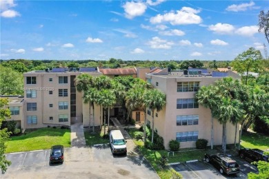 WELCOME HOME TO LIVE OAK CONDOS LOCATED IN PINE ISLAND RIDGE on Pine Island Ridge Country Club in Florida - for sale on GolfHomes.com, golf home, golf lot