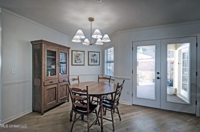 Discover modern comfort and golf course living in this on Bay Pointe Golf and Resort in Mississippi - for sale on GolfHomes.com, golf home, golf lot