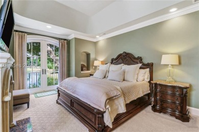 Modern European elegance meets Lowcountry charm. Nestled beneath on Colleton River Plantation Club in South Carolina - for sale on GolfHomes.com, golf home, golf lot