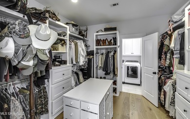 This welcoming Lake Caroline Home in Madison, MS offers high on Lake Caroline Golf Club in Mississippi - for sale on GolfHomes.com, golf home, golf lot