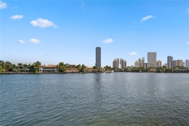 Beautiful corner condo with panoramic water views. Wood floors on Turnberry Isle Resort and Club in Florida - for sale on GolfHomes.com, golf home, golf lot