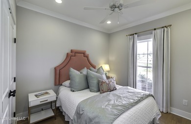 This welcoming Lake Caroline Home in Madison, MS offers high on Lake Caroline Golf Club in Mississippi - for sale on GolfHomes.com, golf home, golf lot