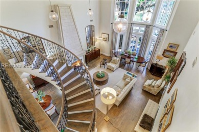 Modern European elegance meets Lowcountry charm. Nestled beneath on Colleton River Plantation Club in South Carolina - for sale on GolfHomes.com, golf home, golf lot