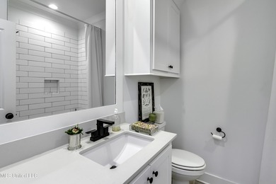 This welcoming Lake Caroline Home in Madison, MS offers high on Lake Caroline Golf Club in Mississippi - for sale on GolfHomes.com, golf home, golf lot