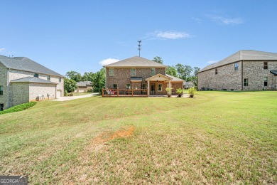 Experience elegance in this 2019-built, 5-bedroom, 3-bathroom on Crystal Lake Golf and Country Club in Georgia - for sale on GolfHomes.com, golf home, golf lot