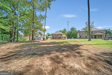 Experience elegance in this 2019-built, 5-bedroom, 3-bathroom on Crystal Lake Golf and Country Club in Georgia - for sale on GolfHomes.com, golf home, golf lot