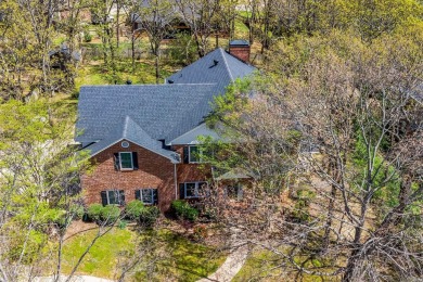 Embrace contemporary elegance in this 4-bed, 4-bath haven on Cadron Valley Country Club in Arkansas - for sale on GolfHomes.com, golf home, golf lot