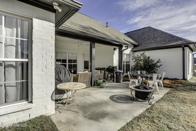 This welcoming Lake Caroline Home in Madison, MS offers high on Lake Caroline Golf Club in Mississippi - for sale on GolfHomes.com, golf home, golf lot