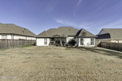 This welcoming Lake Caroline Home in Madison, MS offers high on Lake Caroline Golf Club in Mississippi - for sale on GolfHomes.com, golf home, golf lot