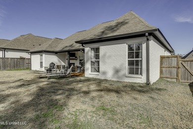 This welcoming Lake Caroline Home in Madison, MS offers high on Lake Caroline Golf Club in Mississippi - for sale on GolfHomes.com, golf home, golf lot