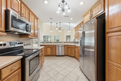 Nestled on a beautifully manicured corner lot along the 10th tee on Heritage Club in South Carolina - for sale on GolfHomes.com, golf home, golf lot