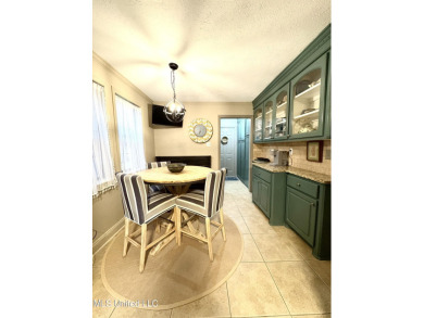 Beautifully updated 4 bedroom home is walking distance to the on Castlewoods Golf Club in Mississippi - for sale on GolfHomes.com, golf home, golf lot
