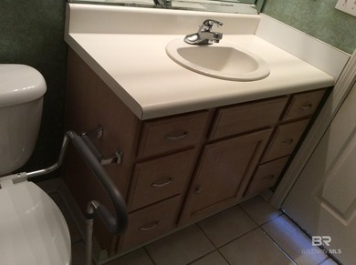 Tucked inside the natural beauty of Glenlakes Golf Club, this on Glenlakes Golf Club in Alabama - for sale on GolfHomes.com, golf home, golf lot