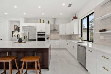 Step into your own private resort compound in Palm Beach Country on Jupiter Country Club in Florida - for sale on GolfHomes.com, golf home, golf lot