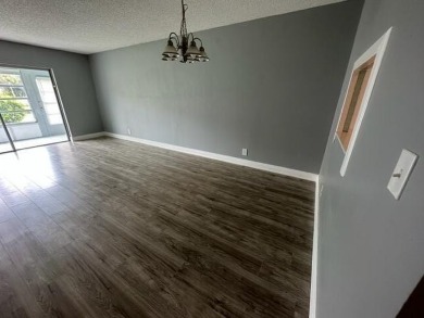 55+ COMMUNITY.UNFURNISHED, BEST LOCATION, FIRST FLOOR CORNER on Marina Lakes Golf Course in Florida - for sale on GolfHomes.com, golf home, golf lot