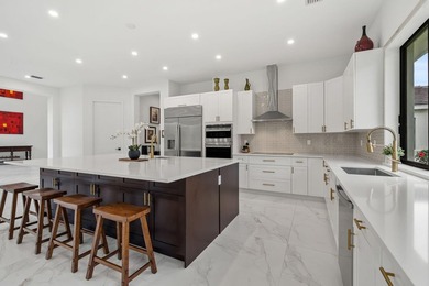 Step into your own private resort compound in Palm Beach Country on Jupiter Country Club in Florida - for sale on GolfHomes.com, golf home, golf lot