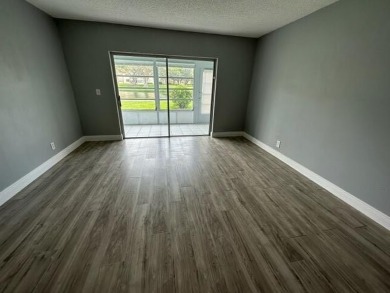 55+ COMMUNITY.UNFURNISHED, BEST LOCATION, FIRST FLOOR CORNER on Marina Lakes Golf Course in Florida - for sale on GolfHomes.com, golf home, golf lot