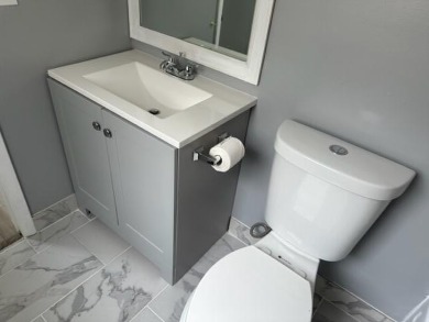 55+ COMMUNITY.UNFURNISHED, BEST LOCATION, FIRST FLOOR CORNER on Marina Lakes Golf Course in Florida - for sale on GolfHomes.com, golf home, golf lot