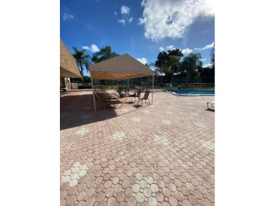 55+ COMMUNITY.UNFURNISHED, BEST LOCATION, FIRST FLOOR CORNER on Marina Lakes Golf Course in Florida - for sale on GolfHomes.com, golf home, golf lot
