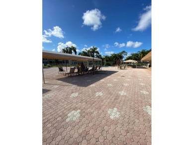 55+ COMMUNITY.UNFURNISHED, BEST LOCATION, FIRST FLOOR CORNER on Marina Lakes Golf Course in Florida - for sale on GolfHomes.com, golf home, golf lot