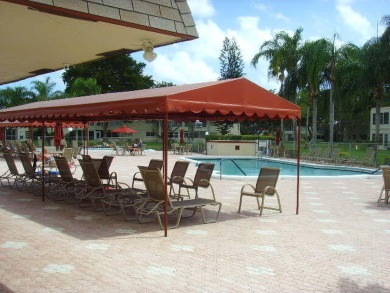 55+ COMMUNITY.UNFURNISHED, BEST LOCATION, FIRST FLOOR CORNER on Marina Lakes Golf Course in Florida - for sale on GolfHomes.com, golf home, golf lot