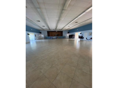 55+ COMMUNITY.UNFURNISHED, BEST LOCATION, FIRST FLOOR CORNER on Marina Lakes Golf Course in Florida - for sale on GolfHomes.com, golf home, golf lot