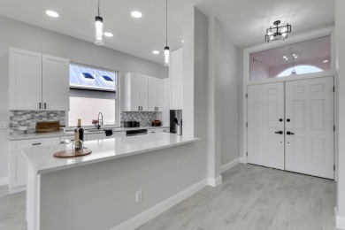 Fully renovated home in The Preserve of Hobe Sound featuring a on Lost Lake Golf Club in Florida - for sale on GolfHomes.com, golf home, golf lot