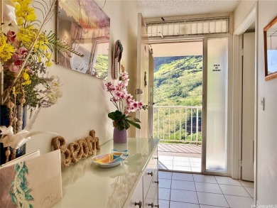 Situated in the highly sought-after and rarely available 1-stack on Makaha Valley Country Club in Hawaii - for sale on GolfHomes.com, golf home, golf lot