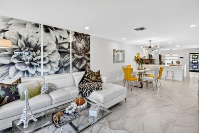 Step into luxury living with this recently and beautifully on Villa Del Ray Golf Club in Florida - for sale on GolfHomes.com, golf home, golf lot