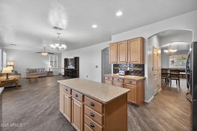 Spacious home in Johnson Ranch featuring 6 big bedrooms and 3 on The Golf Club At Johnson Ranch in Arizona - for sale on GolfHomes.com, golf home, golf lot