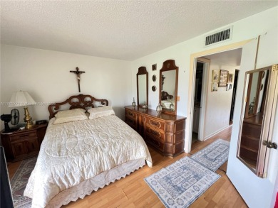 HOME SWEET HOME! Live in this Sunrise resort-like community on Sunrise Lakes Phase III in Florida - for sale on GolfHomes.com, golf home, golf lot
