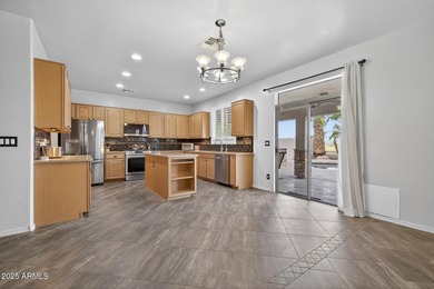 Spacious home in Johnson Ranch featuring 6 big bedrooms and 3 on The Golf Club At Johnson Ranch in Arizona - for sale on GolfHomes.com, golf home, golf lot