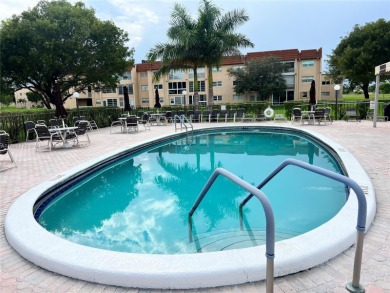 HOME SWEET HOME! Live in this Sunrise resort-like community on Sunrise Lakes Phase III in Florida - for sale on GolfHomes.com, golf home, golf lot