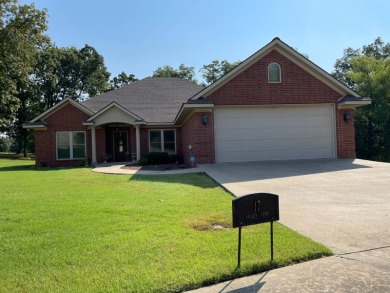 Stunning 3 Bed 2 Bath Custom Built home with a garage located on on The Course At Eagle Mountain in Arkansas - for sale on GolfHomes.com, golf home, golf lot