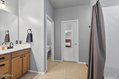 Spacious home in Johnson Ranch featuring 6 big bedrooms and 3 on The Golf Club At Johnson Ranch in Arizona - for sale on GolfHomes.com, golf home, golf lot