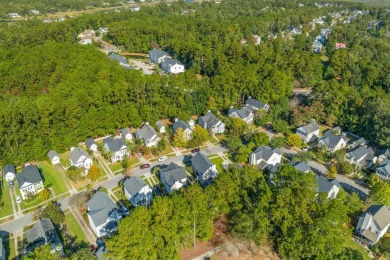 Welcome to this charming Charleston-style home, showcasing on Charleston National Golf Club in South Carolina - for sale on GolfHomes.com, golf home, golf lot